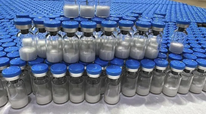 Rows of lyophilized peptide vials with sealed caps prepared for blind batch sampling